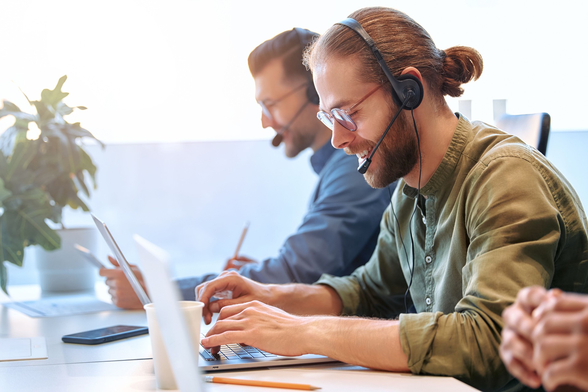 Successful hipster team in coworking. Freelancers.